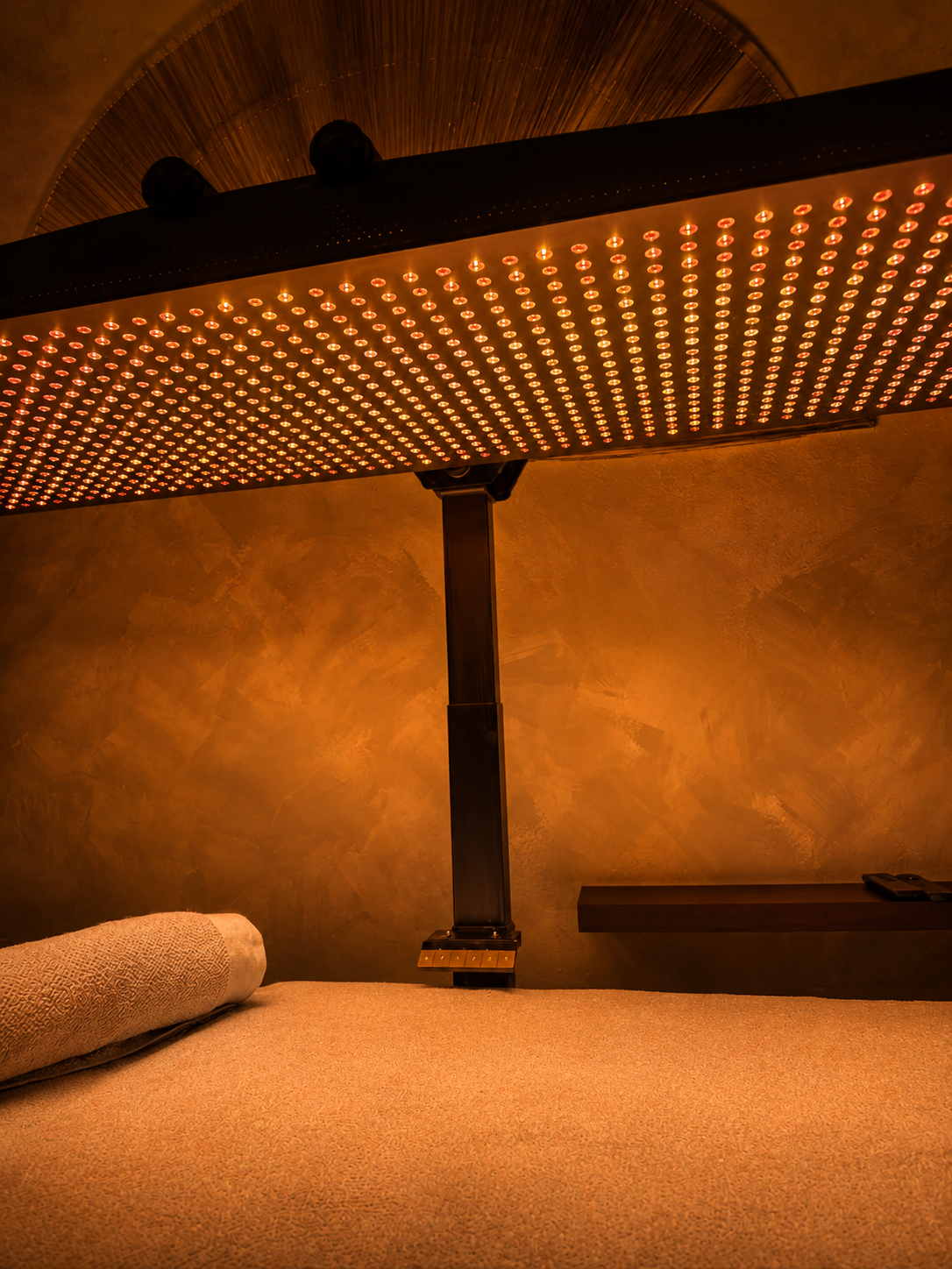 Warm light falling across the treatment bed